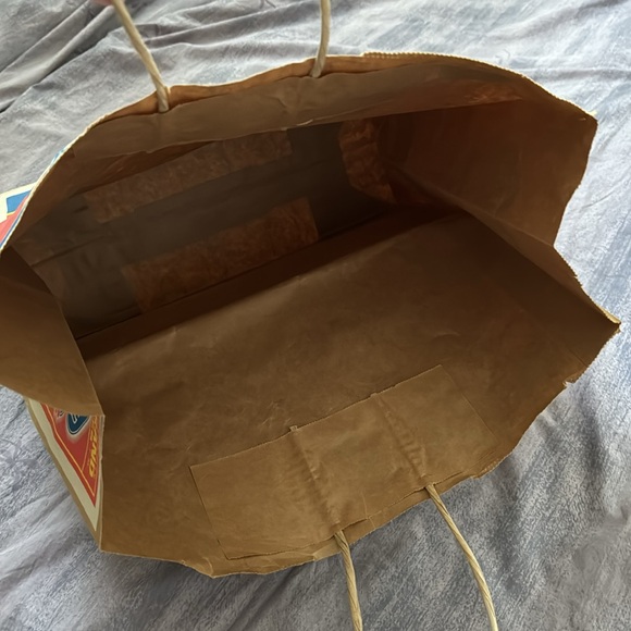 Vintage Lucky Brand Jeans brown paper shopping bag.  Circus themed. Used. - Picture 3 of 3